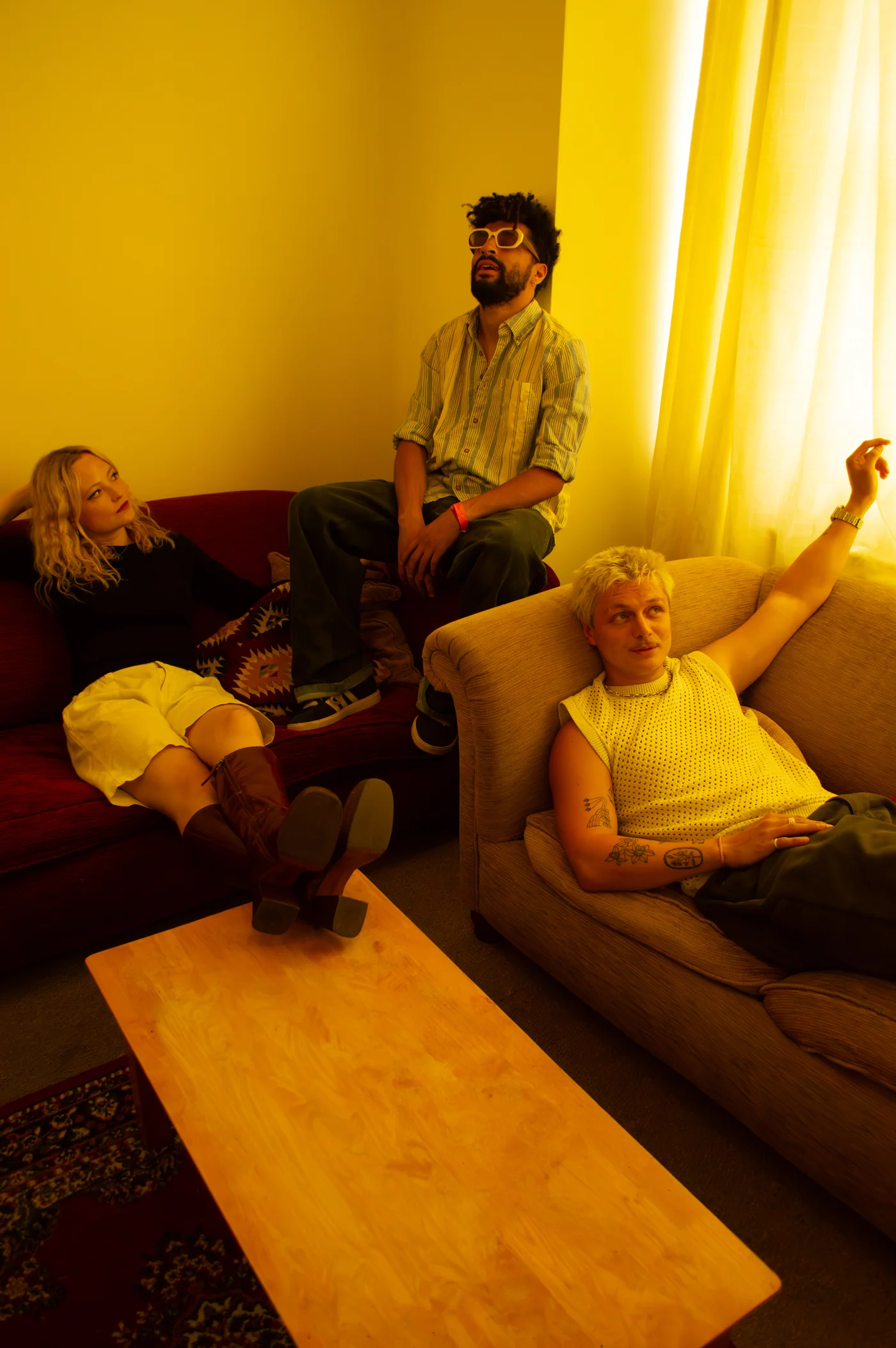Alien Chicks together in a warmly lit room, photographed by CJ Kerr