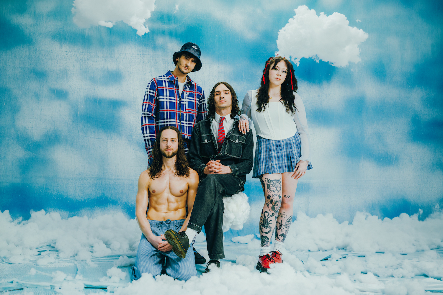 unpeople photographed against a cloud backdrop by Bridie Cummings